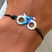 Brazalete de bicicleta blanca y azul